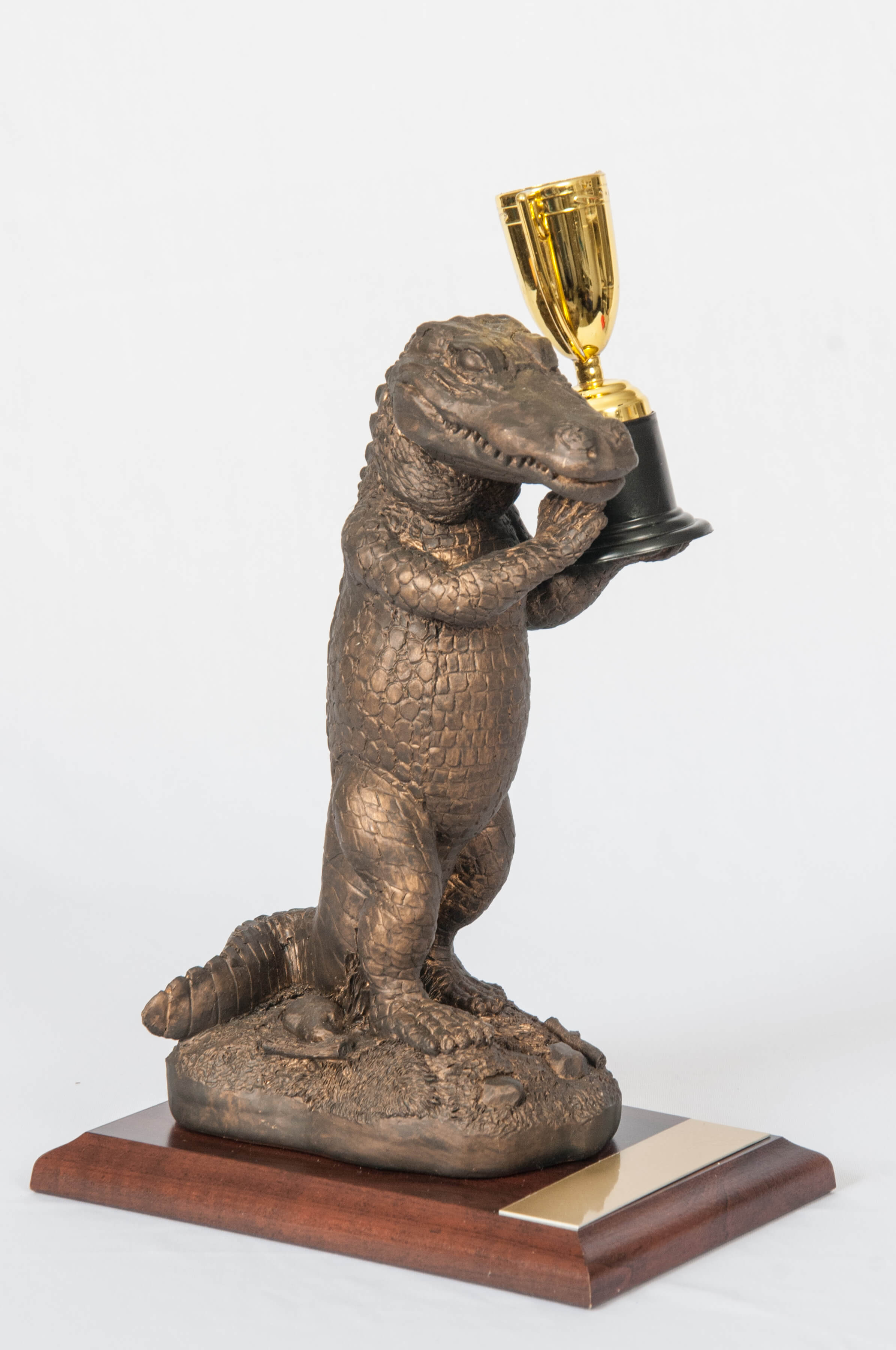 left side standing gator award with cup